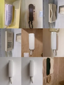 Collage of old wall-mounted telephones and intercom panels in beige tones with coiled cords.